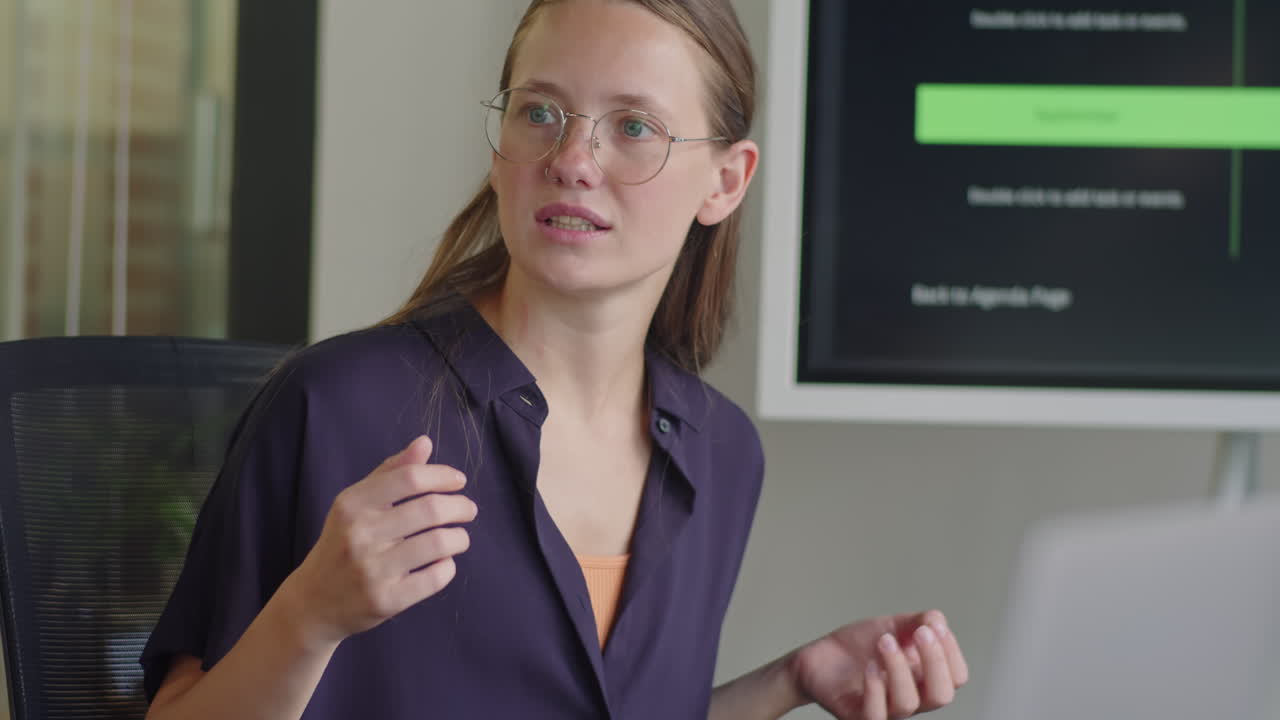 Young Multi-Ethnic Colleagues Having Discussion on Team Meeting