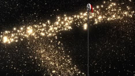 santa hat over microphone against golden shooting star against black background