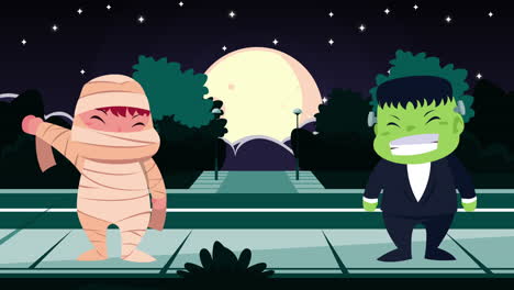 niños lindos disfrazados de momia y frankenstein