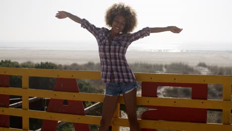 young girl spreading hands and joy