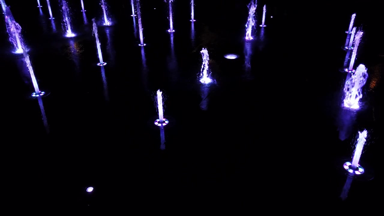 Fountain jets on the city boulevard.