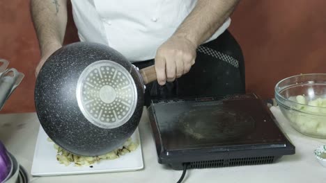 chef shows how to sauté white cauliflower with oil, vegetables in italian dish