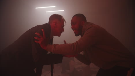 confrontation in a foggy room