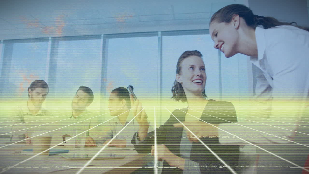 Business team collaborating at office with digital grid overlay animation