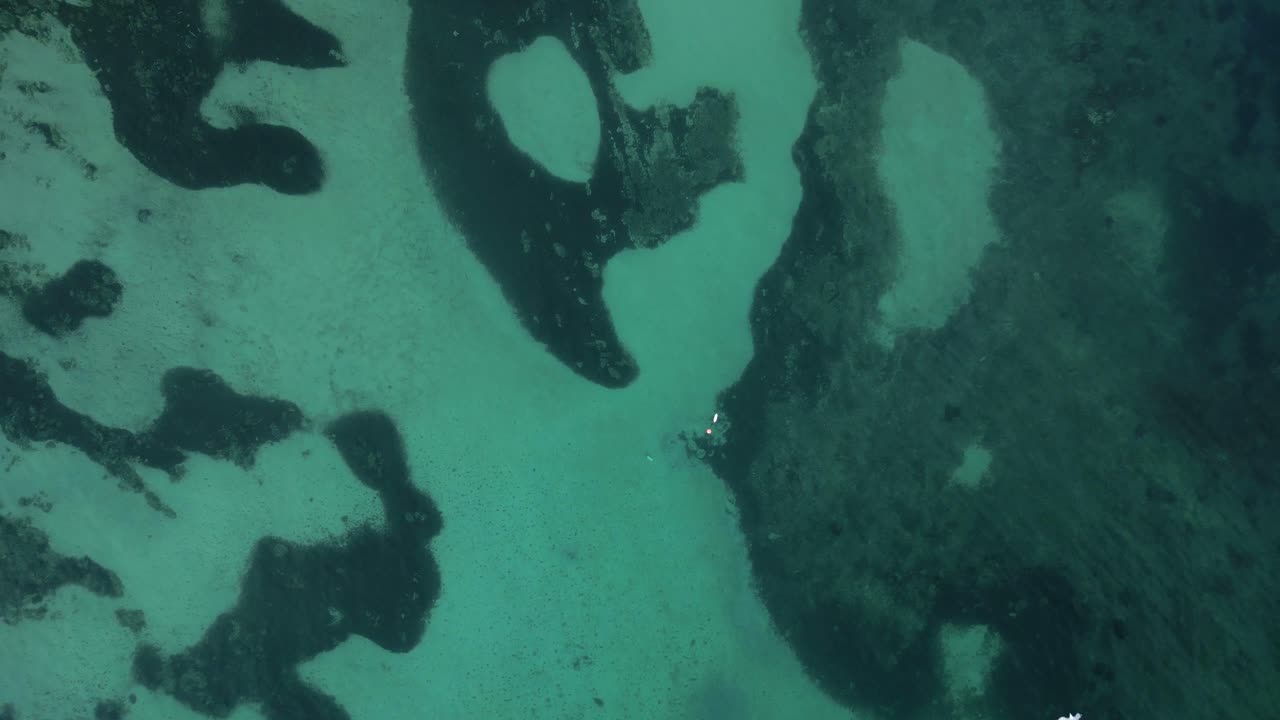 Breathtaking aerial landscape of emerald sea in Mallorca, Spain. Top view