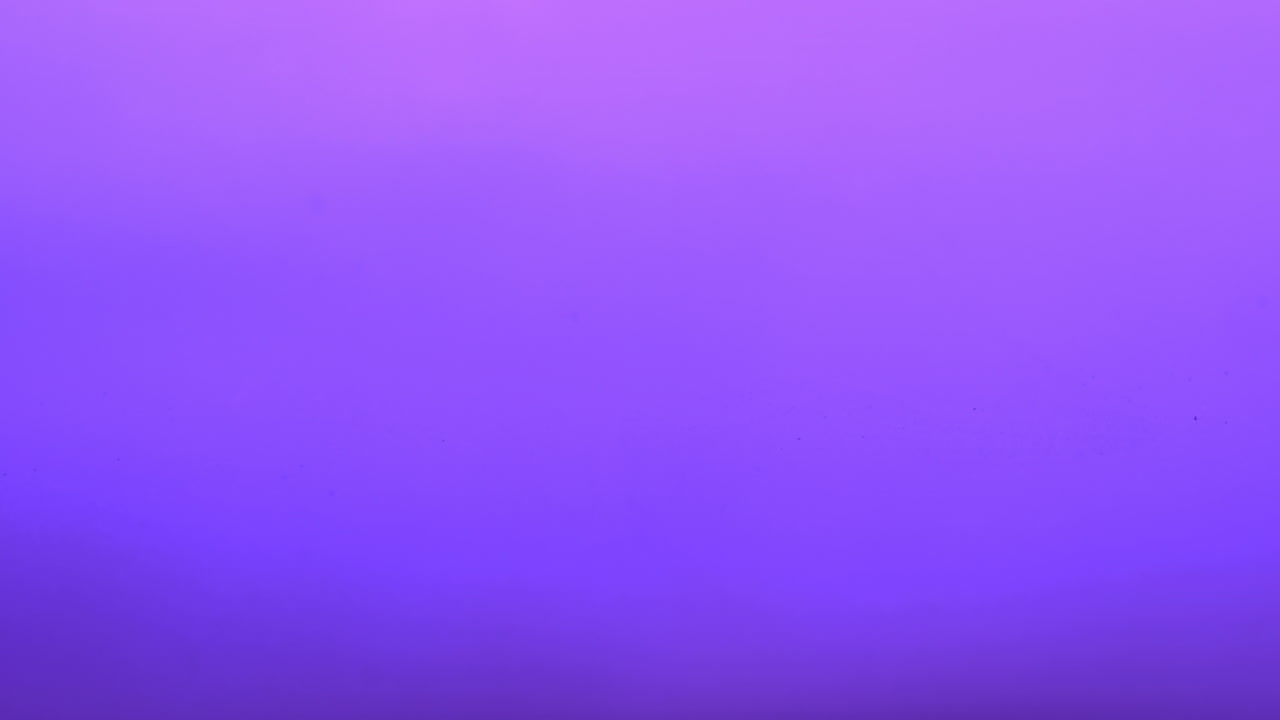 animación de texto de feliz navidad sobre ondas en fondo púrpura