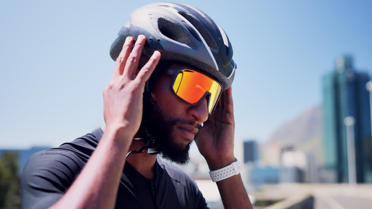 Male Cyclist Adjusting Helmet and Sunglasses Before a Ride