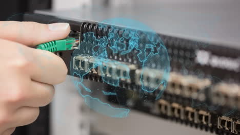 animation of globe over caucasian male worker inspecting server room