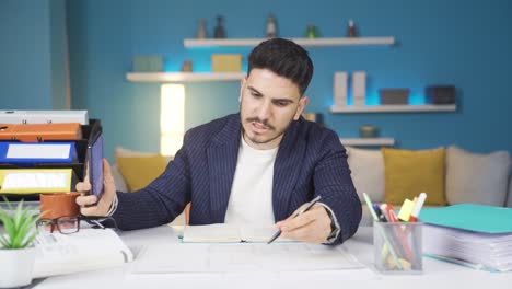 Home-office-worker-making-a-video-call-on-the-phone.