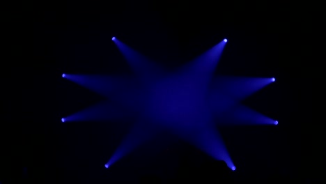 multiple spotlights on stage