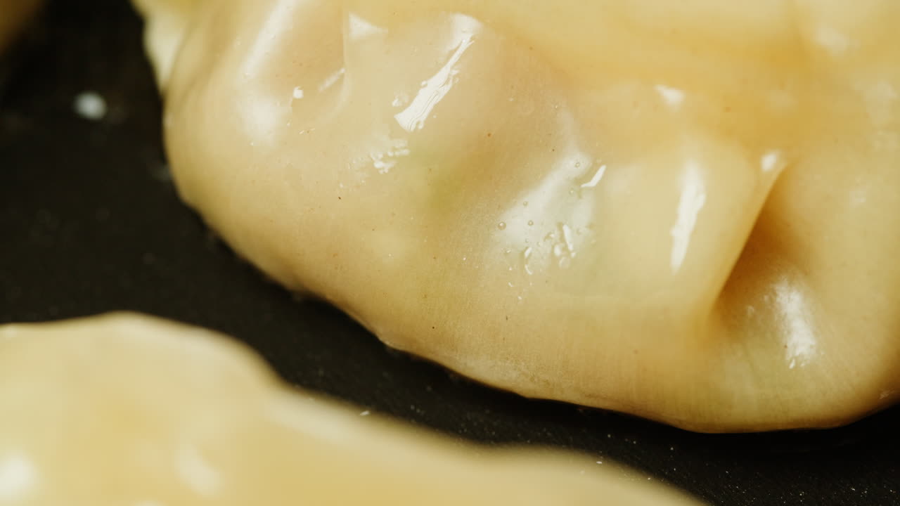Close-up of a Dumpling Cooking in a Hot Pan