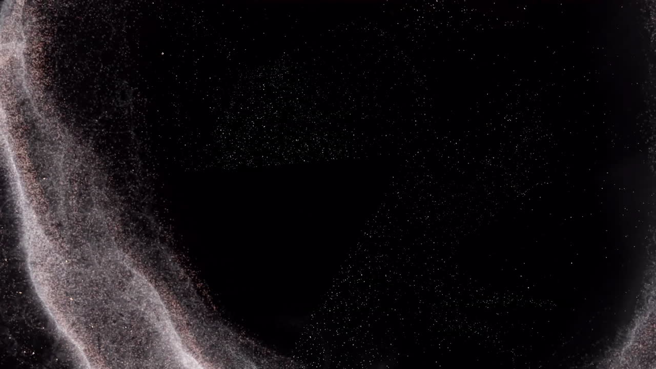 Forming abstract shapes, swirling particles in space-themed animation