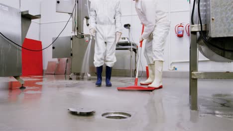 butchers cleaning floor