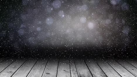Animation-of-snow-falling-over-spots-of-light-and-wooden-boards