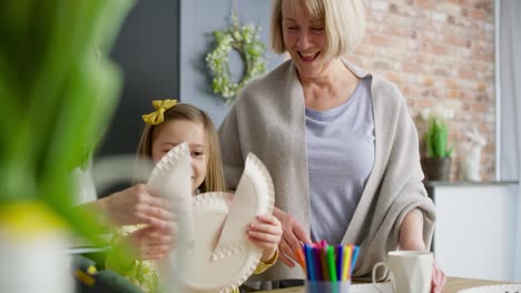 video of grandma admiring with her granddaughter's handmade easter bunny