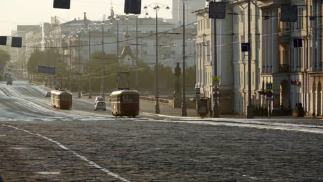 city street with trams in the morning