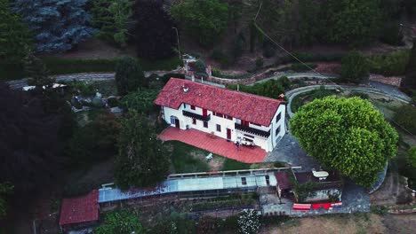 Drone-shot-of-hotel-complex-L'Uovo-e-la-Faina-near-Cuneo,-Italy