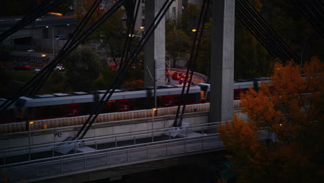 tram metro line crosses suspension bridge at blue hour dusk in spittelau vienna austria