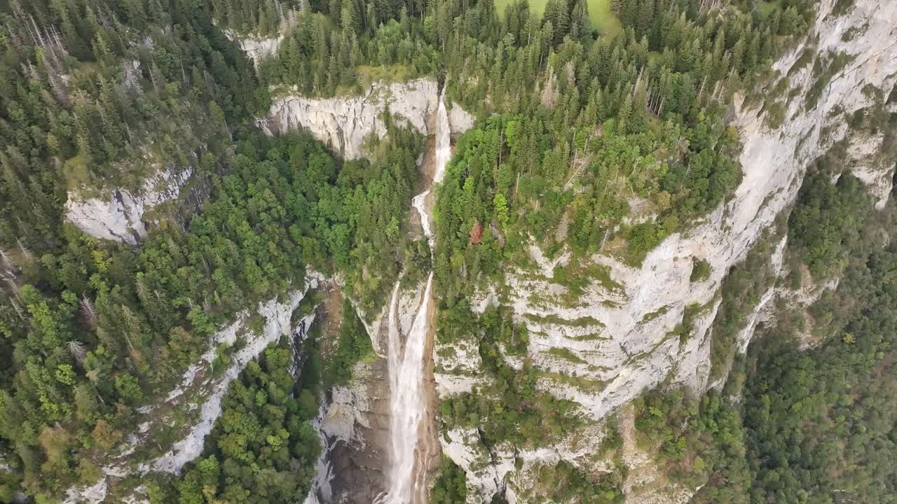 Seerenbachfälle are three waterfalls at Walensee, one of the highest waterfalls in Switzerland, located near the village of Betlis. Drone view.
