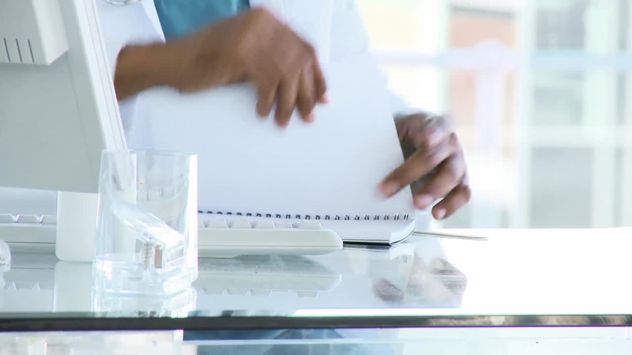 Close up of doctor writing a prescription