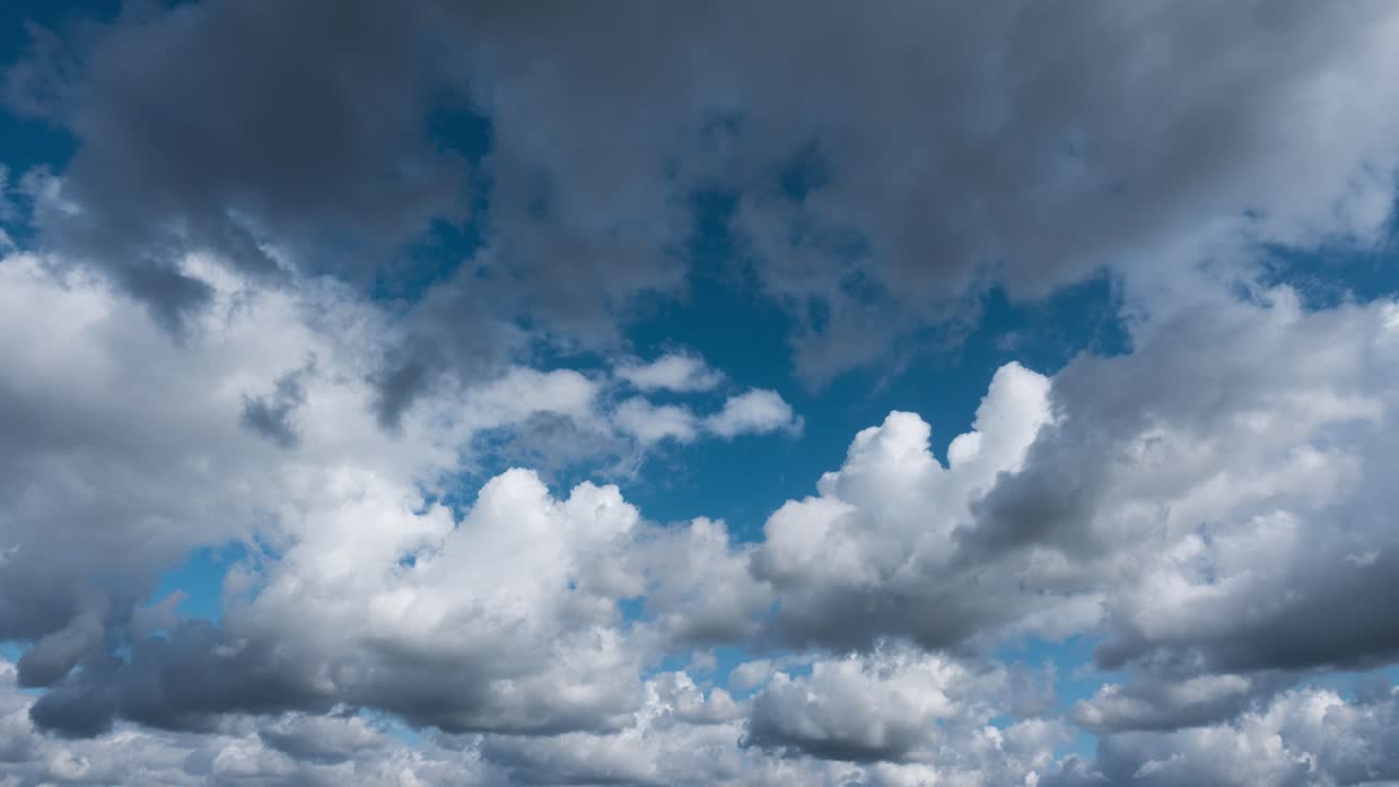 timelapse of puffy white clouds in the blue sky
