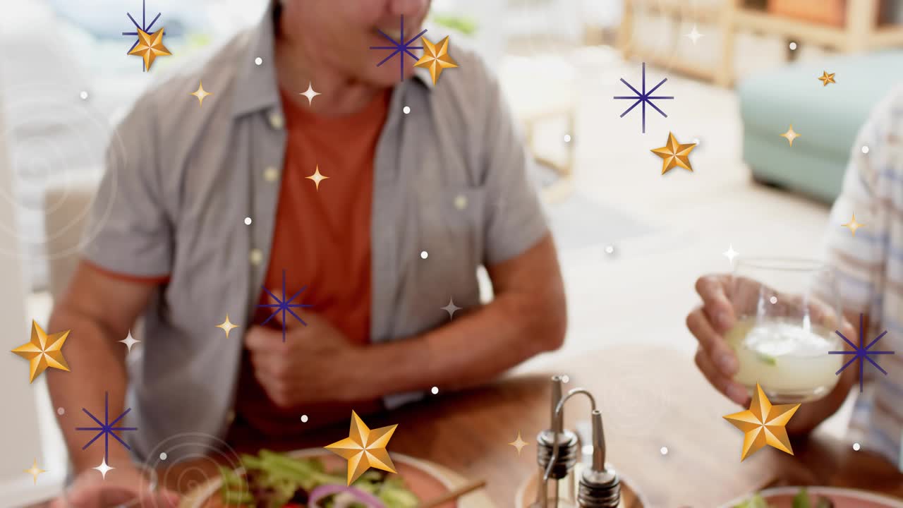 Man in orange starting toast by reaching tumbler, others clinking, gold stars boosting food ads