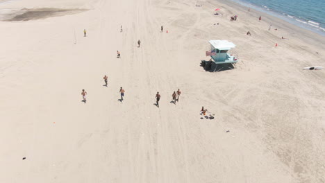 aerial view of men training in beach