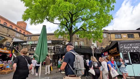 urban scene with tree and people