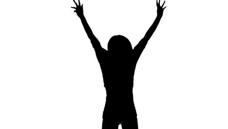 silhouette of a woman jumping and raising her arms on white background