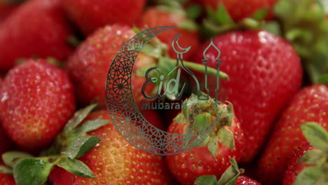 eid mubarak text animation over close-up of fresh strawberries