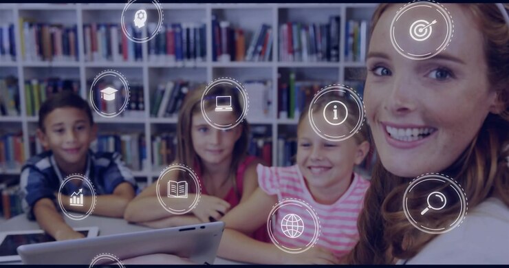 Teacher holding tablet toward class, tilting, causing animated icons engaging students in education