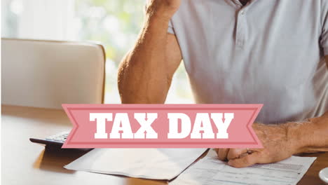 animation of tax day text over worried caucasian man paying bills