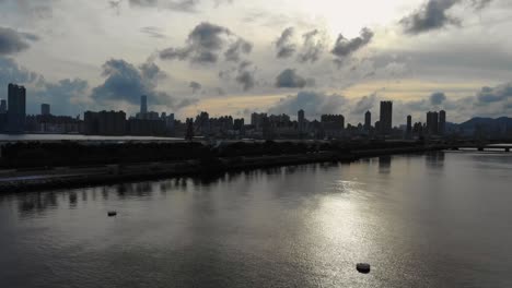 Drone-footage-rising-up-to-Hong-Kong-Skyline-