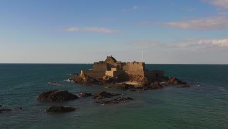 An-aerial-shot-of-an-old-fortress-built-right-off-the-coast-of-St