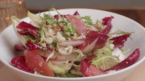 An-appetizing-and-healthy-salad-with-a-variety-of-colors-and-flavors-shown-off-on-a-slowly-rotating-lazy-Susan