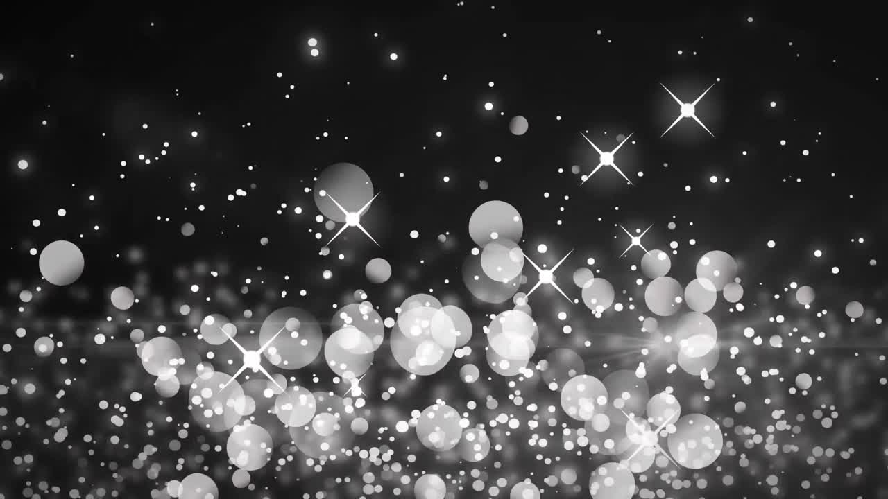 White sparkles and glowing spots moving against purple background