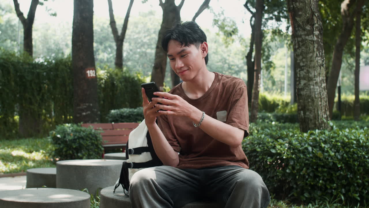 Boy looking at his phone