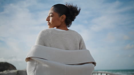 Cheerful-woman-run-beach-in-sunlight-bottom-view.-Relaxed-black-hair-girl-enjoy