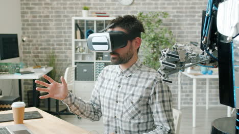 man using vr headset with a robot in a modern office