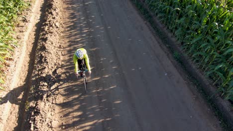 A-dynamic-orbital-perspective-shot-of-a-cyclist-on-an-early-morning-ride