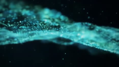 a mesmerizing display of ethereal waves and glimmering particles captured in captivating motion, showcasing the beauty and fluidity of digital art and nature combined.