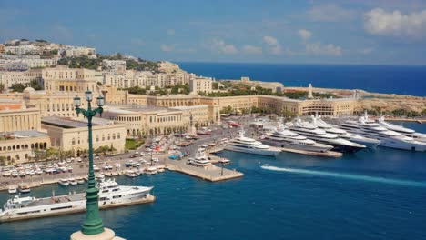 panoramic view of a luxurious mediterranean harbor with yachts and a coastal city