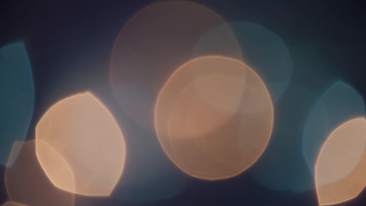 Abstrakt baggrund med blødt glødende bokeh-lys