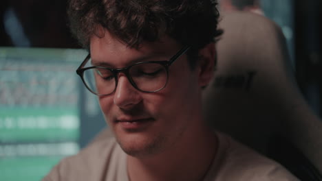 man in front of a computer