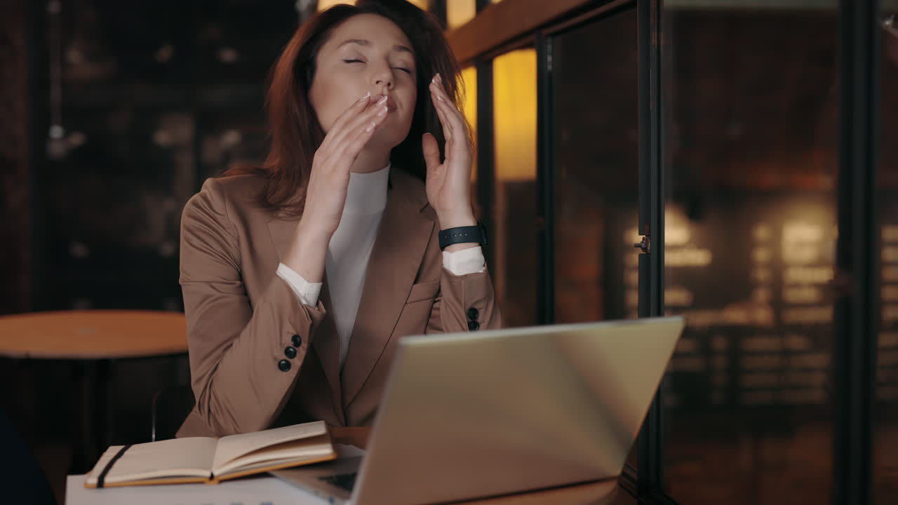 Businesswoman relaxing at cafe