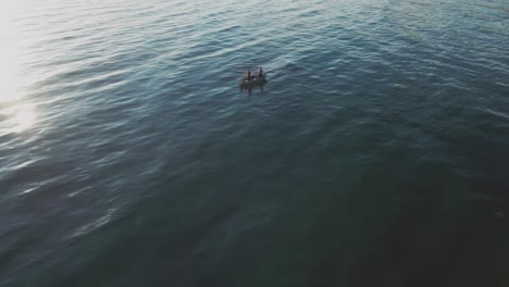 Ocean-waves-with-a-small-fisherman-boat-floating