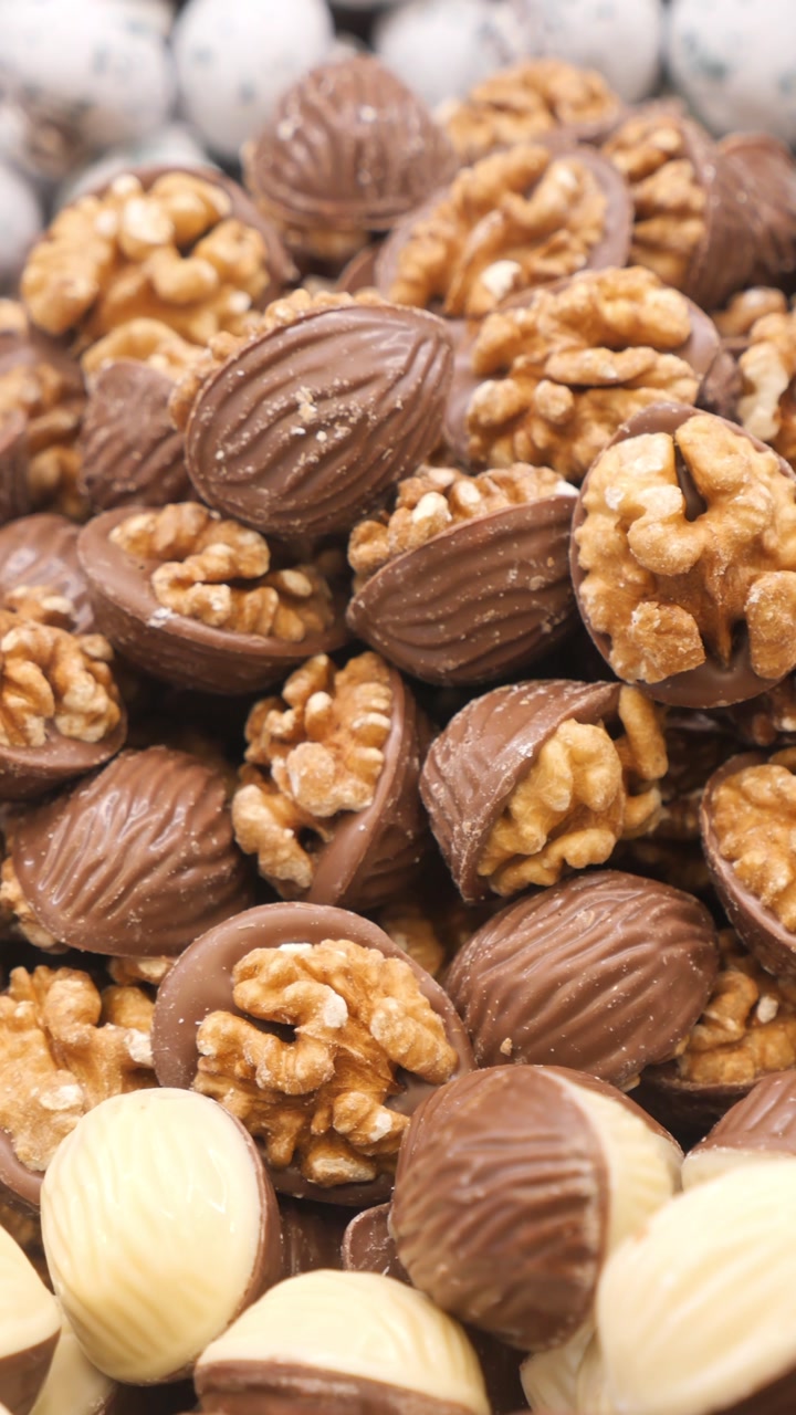 Close-up of Delicious Milk Chocolate Candies with Walnuts