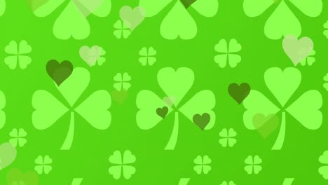 Animation-of-st-patrick's-day-shamrock-and-green-hearts-on-green-background