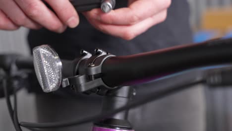 ensuring road safety for bicycle - static closeup view of reflector on handlebar