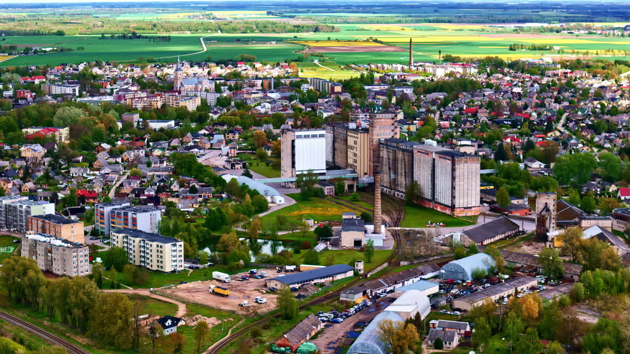 Aerial view of Joniškis featuring agricultural fields, industry, and housing